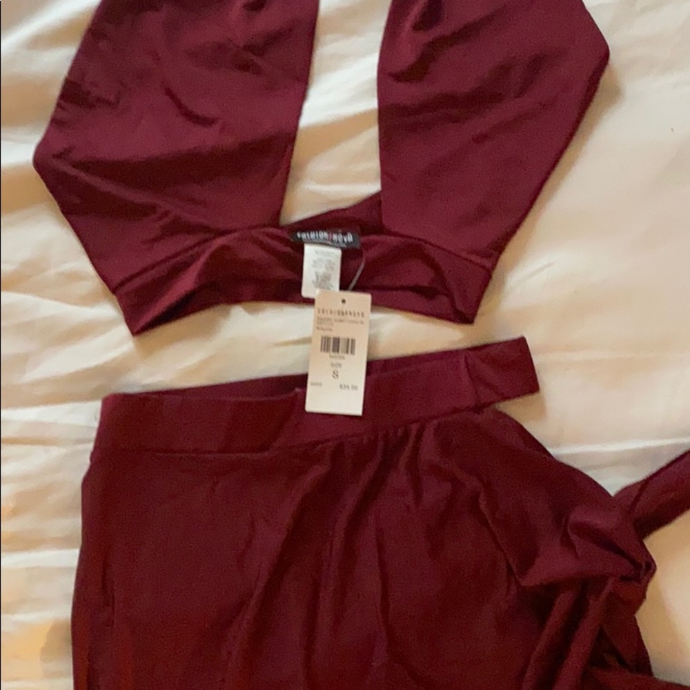 BURGUNDY 2 PIECE OUT FIT. SLIP COMES UP TO THE HIP